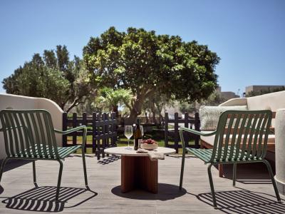 Numo Ierapetra Beach Resort Crete, Curio Collection by Hilton - Evergreen Retreat outdoor living area