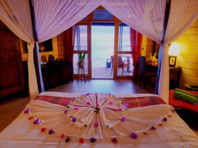Komandoo Island Resort & Spa - Strand Villa