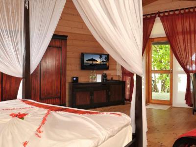 Komandoo Island Resort & Spa - Jacuzzi Strand Villa